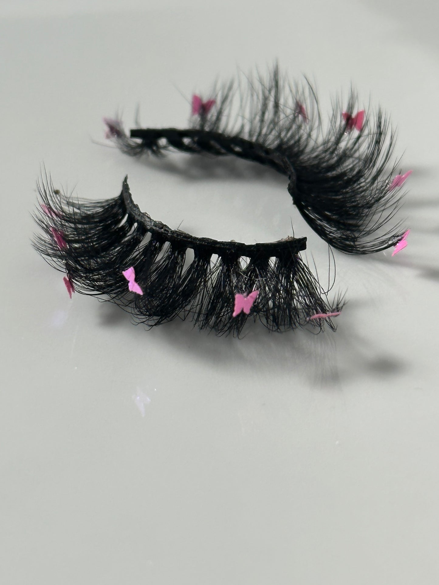 Pink butterfly fake lashes from Fresa Cosmetics 