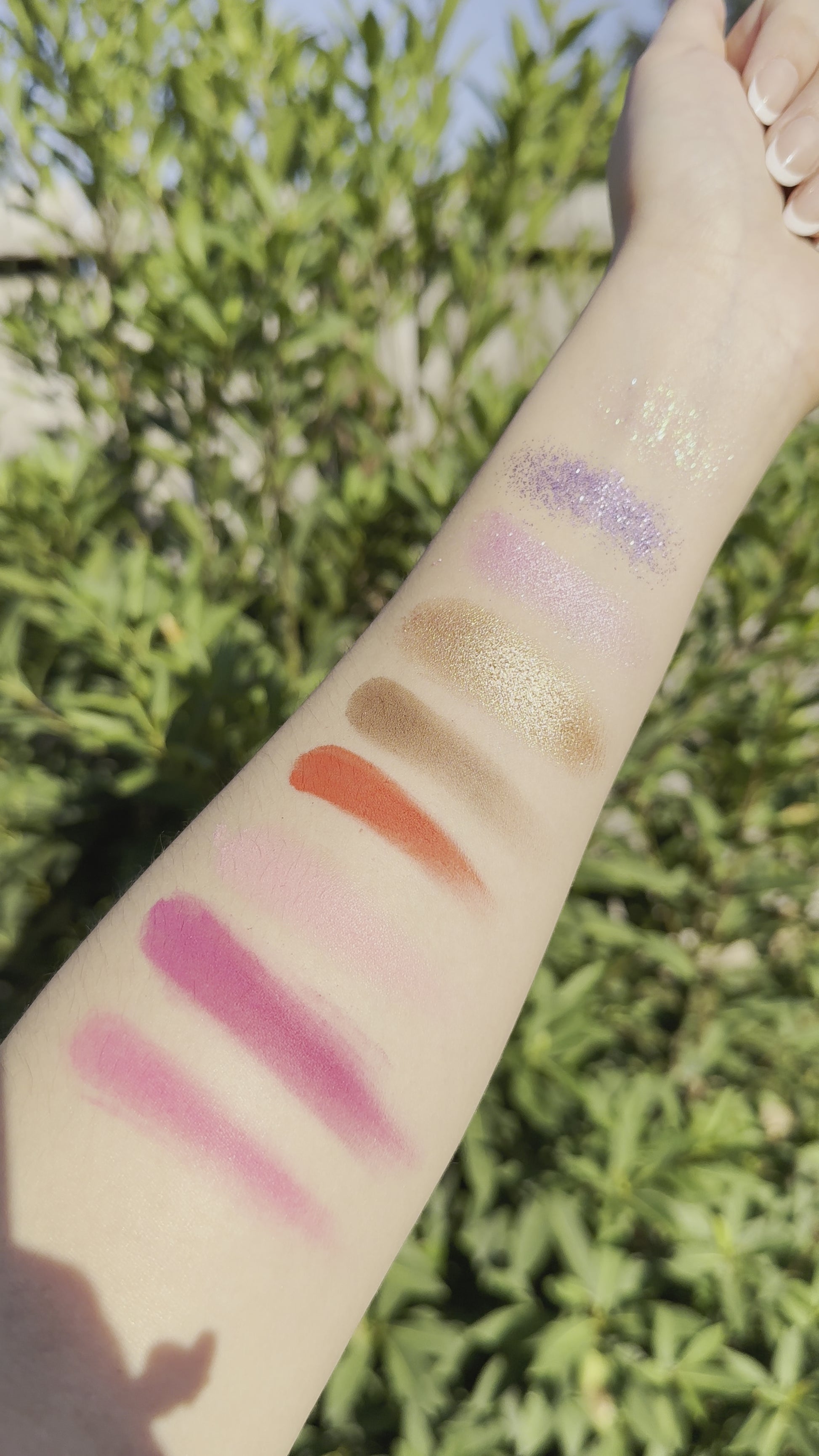 Swatches of the shortcake eyeshadow palette in natural lighting from Fresa Cosmetics